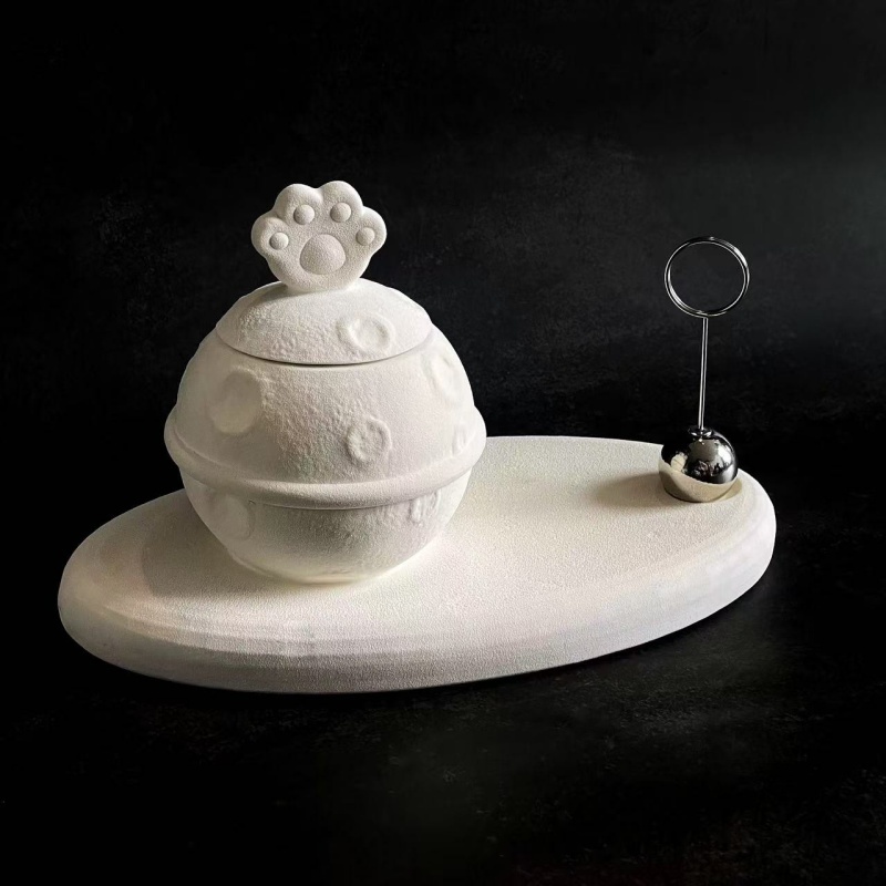 A resin pet urn in the shape of a planet